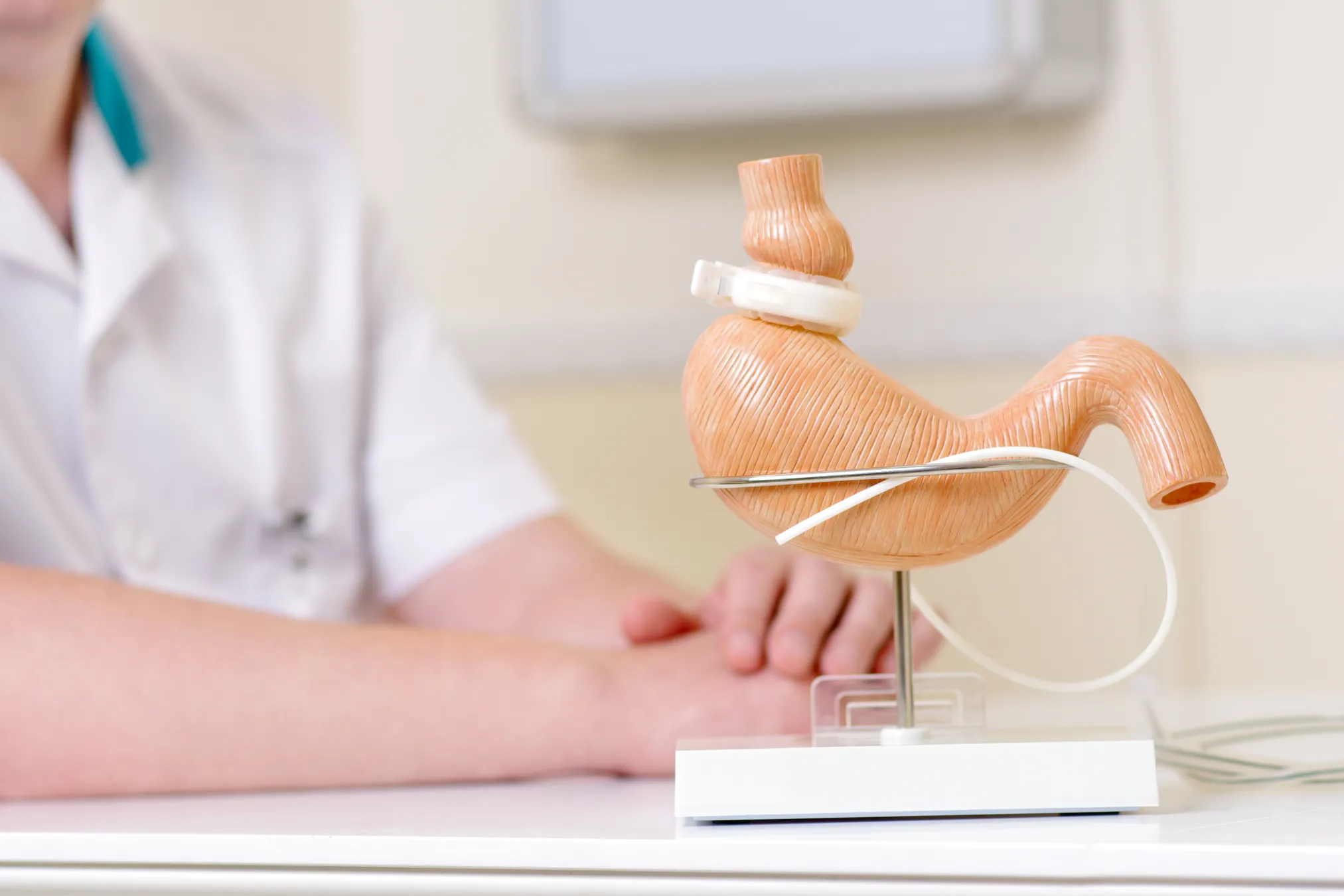 Doctor sitting near prop