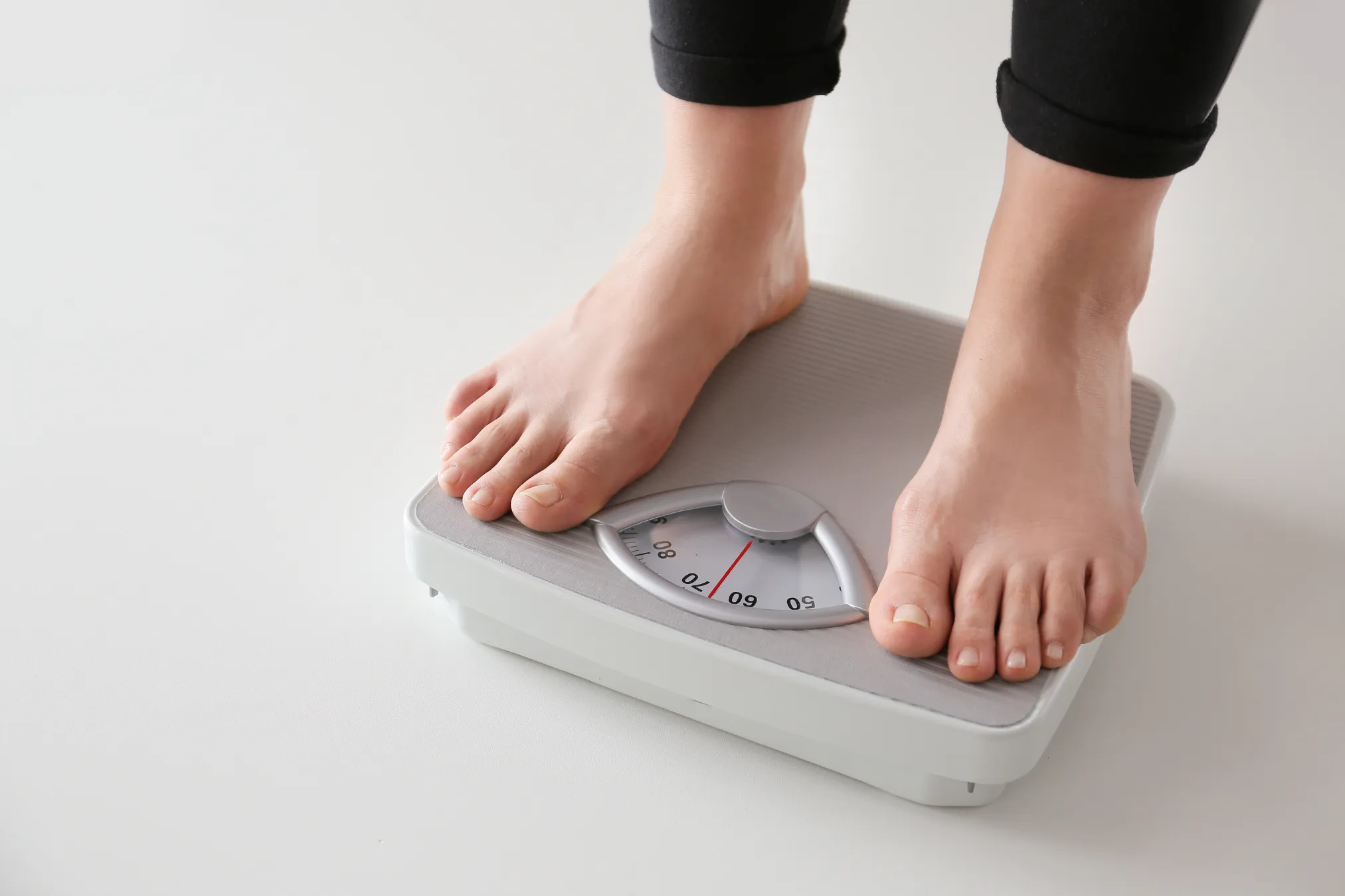 Person standing on scale
