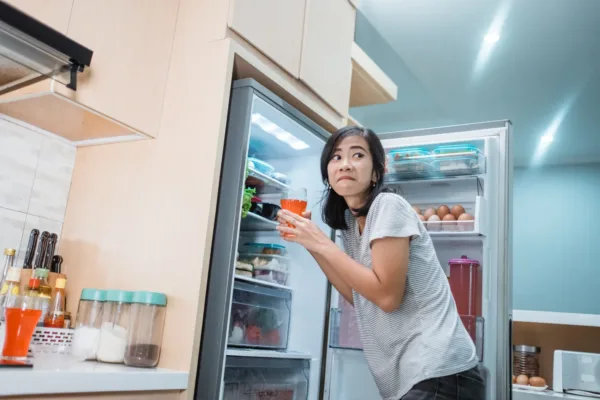 Person opening the fridge mischeivously