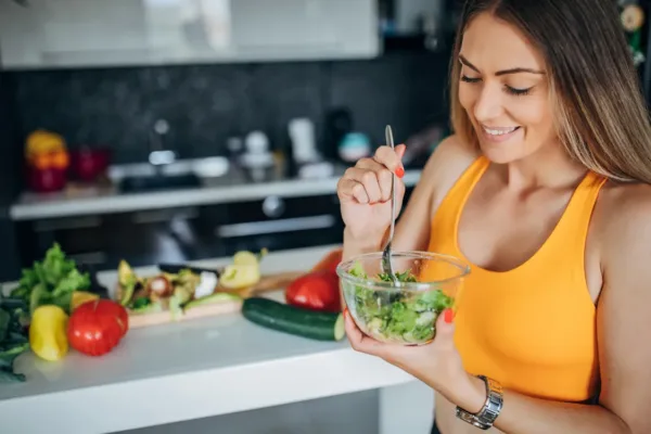 Woman eating a salad