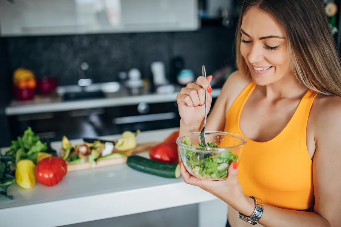 Woman eating a salad
