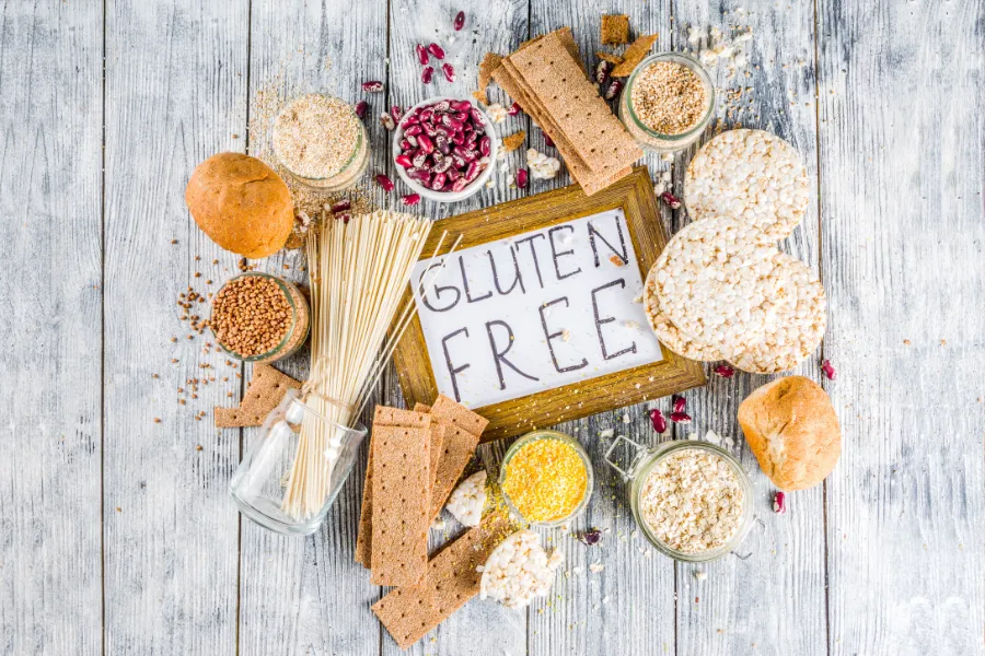 Gluten Free board in center of table with foods surrounding