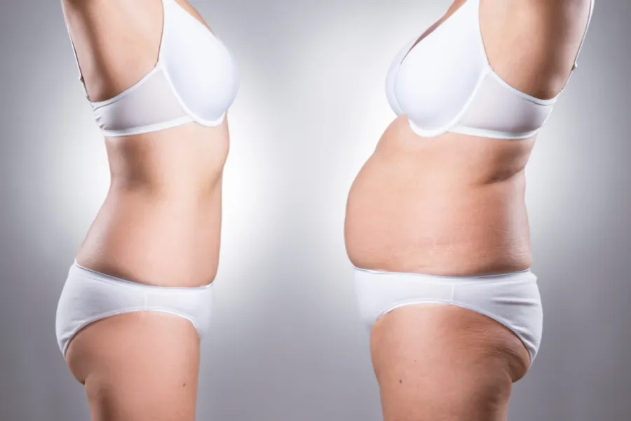 Two wowman facing each other with different body compositions