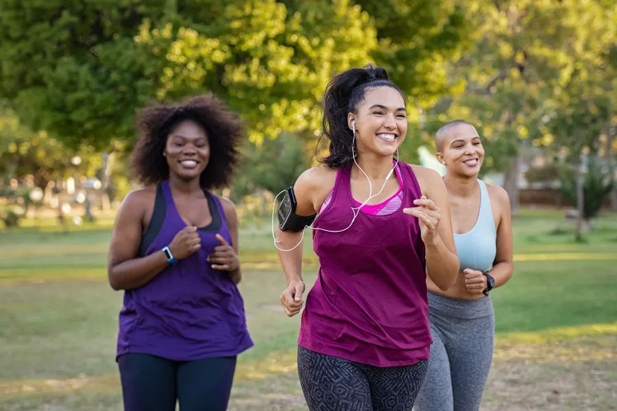 laparoscopic-sleeve-gastrectomy-active-lifestyle Group of women jogging together outdoors as part of a healthy routine after laparoscopic sleeve gastrectomy